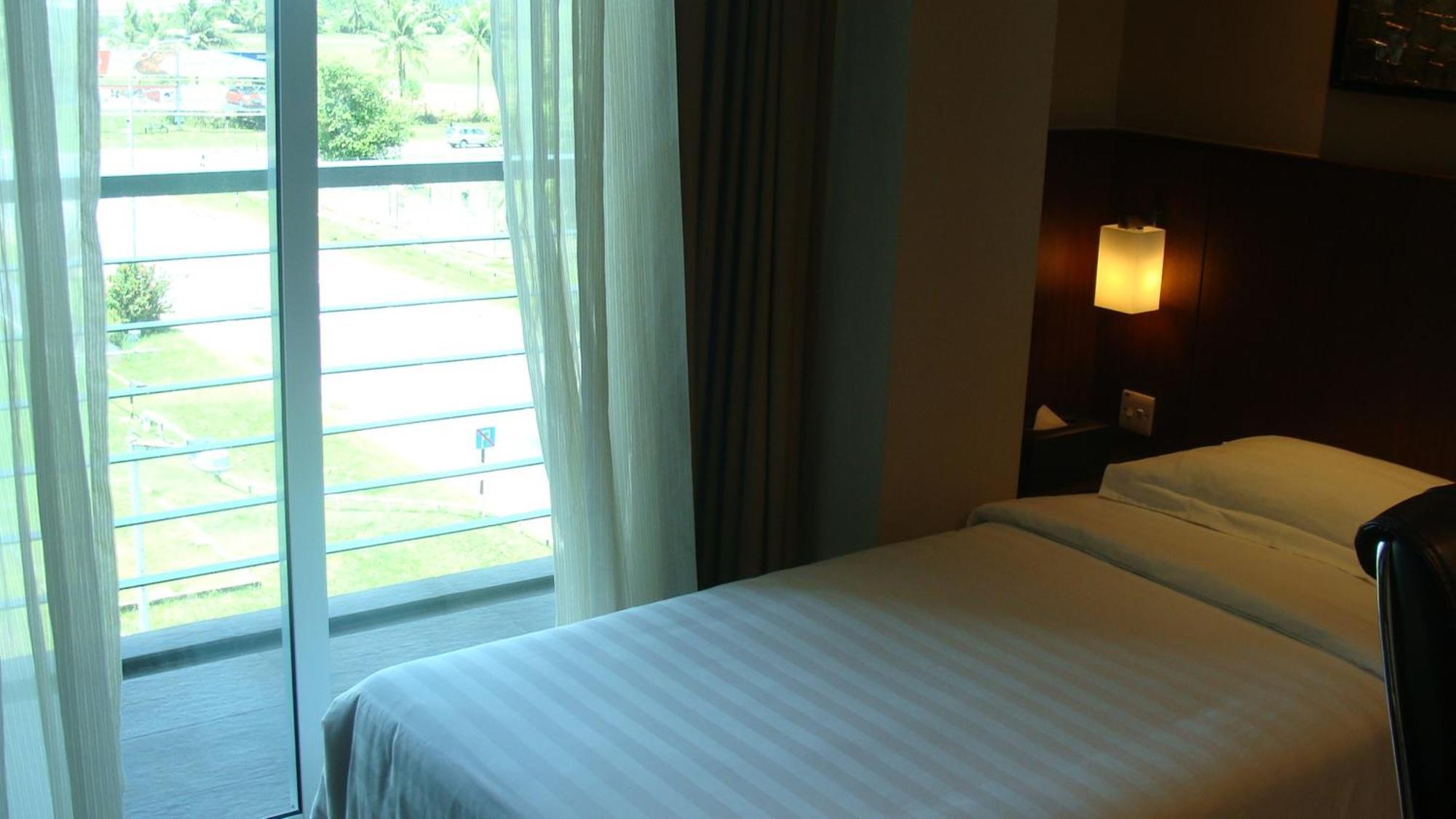 Roomz Hotel Seria Quarto foto